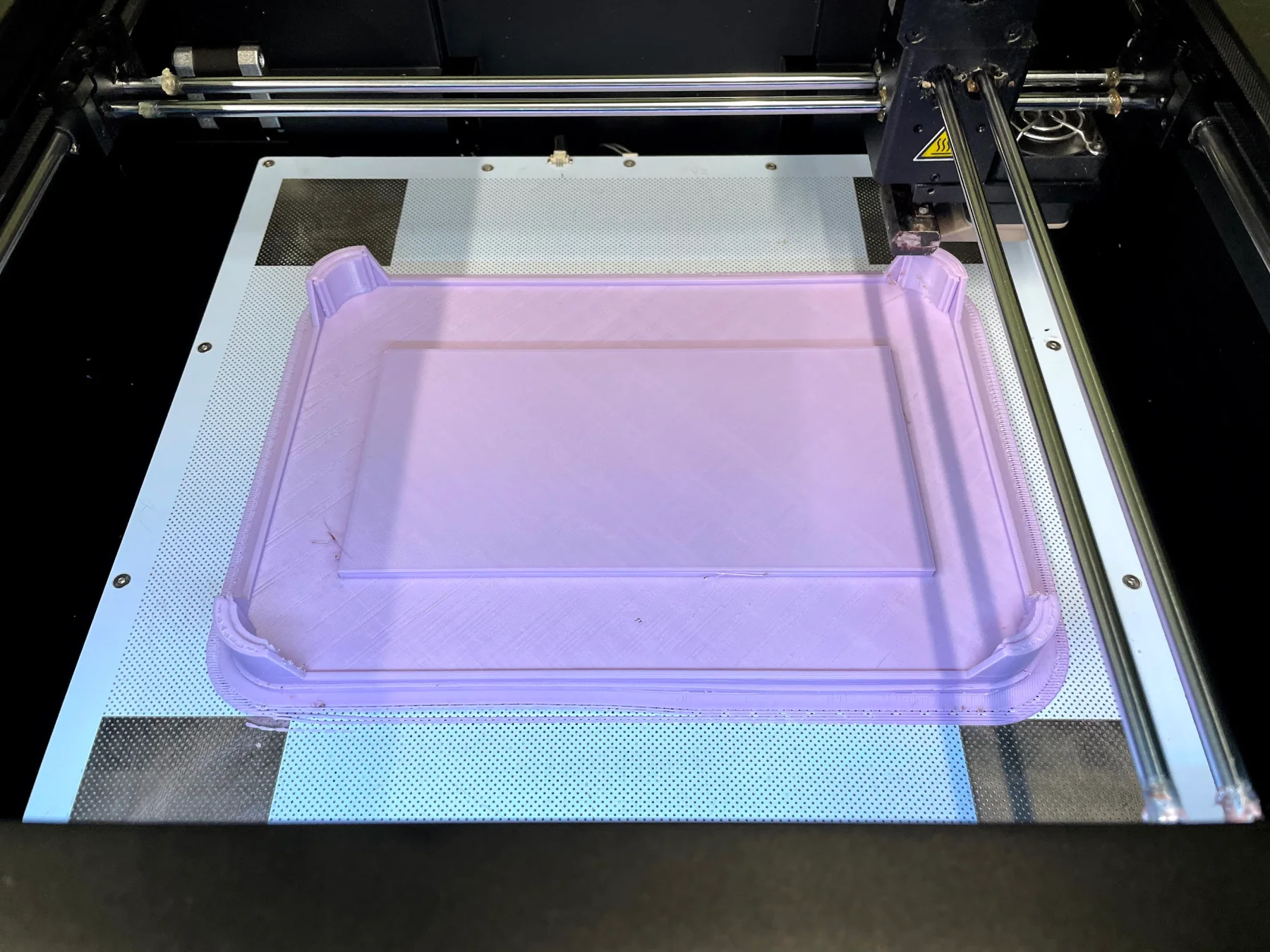 A 3D-printed station component used to work through enclosure and installation constraints before deployment.